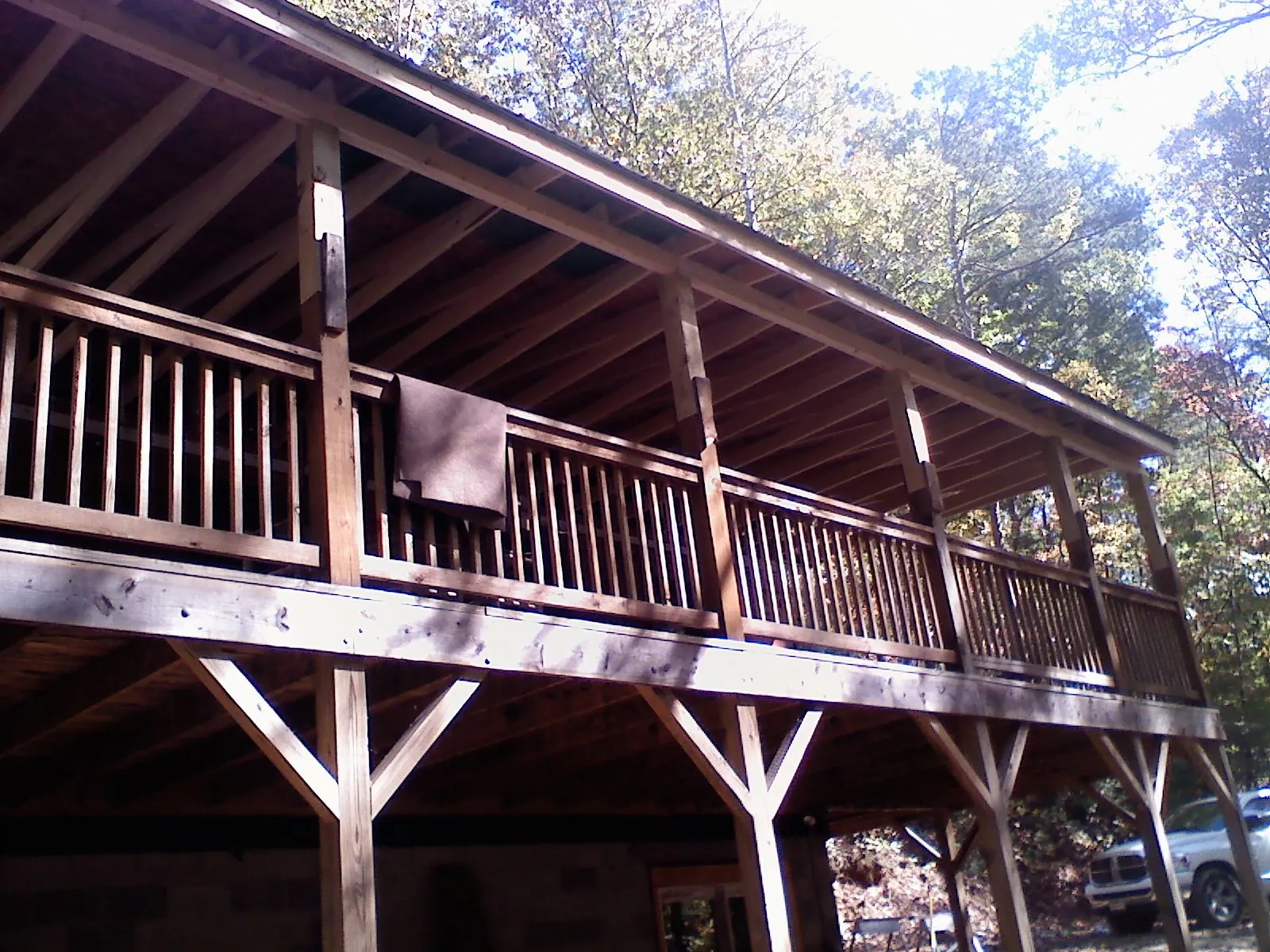 Timber framing under a new elevated porch and deck — Roof Leak Repair in New Ipswich by Roofing Brothers
